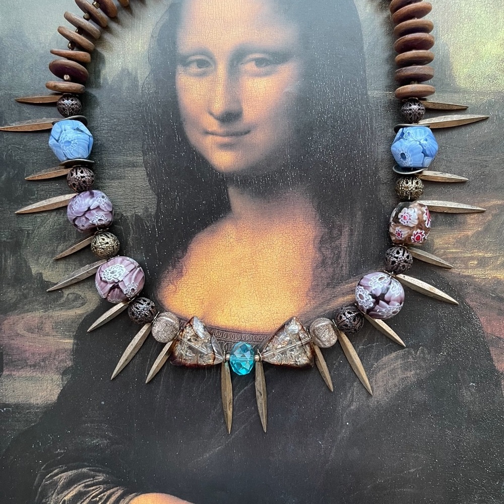Artisan necklace made with beautifully patterned glass and ceramic beads